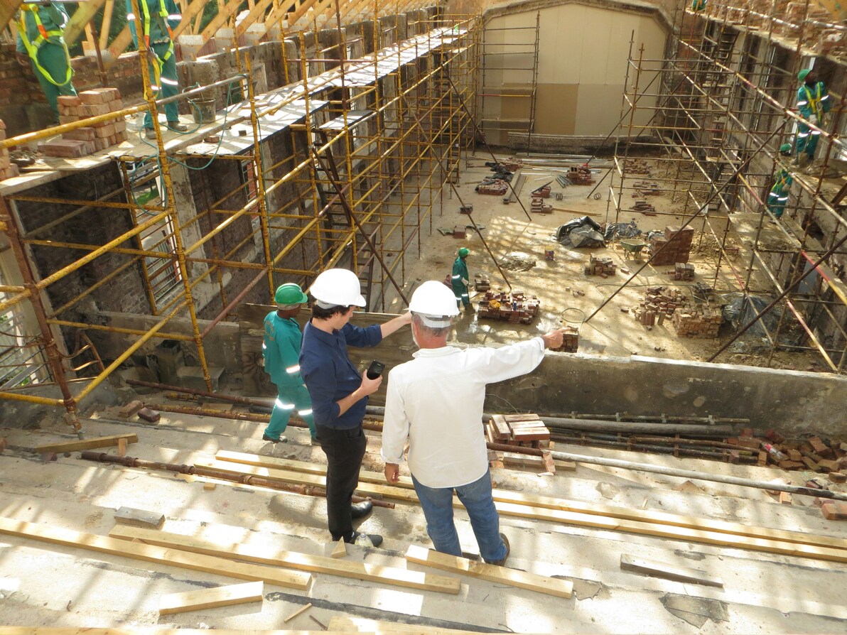 Photo of Daniel Kaufman Real Estate Developer on his construction site, providing guidance to his future property manager.