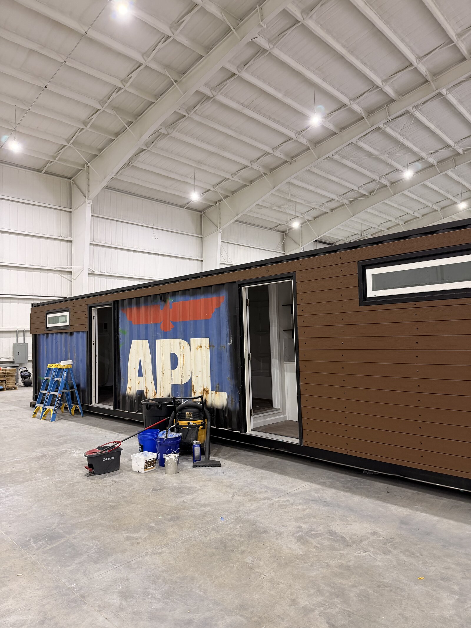 A shipping container mid-conversion into a Mr. Good Container Homes duplex